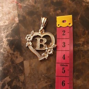 Dije en oro laminado